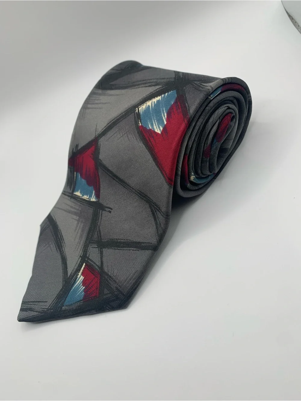 Gray Men's Tie with Red and Blue Abstract Accents